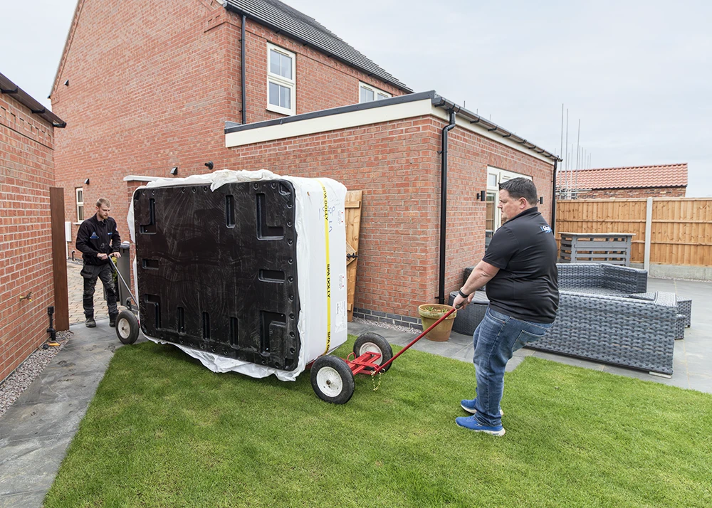 1 Stop Spas moving a Hot Tub though a gate