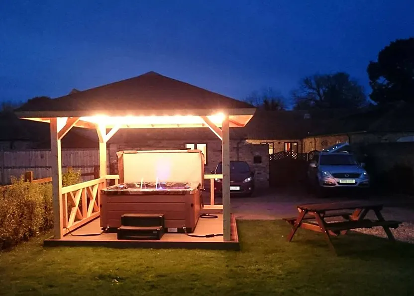 Hot Tub lit up at night