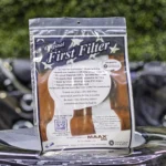 American Whilpool First Filter product photo showing the front of the outer packaging, sat on top of an American Whirlpool hot tub.