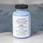 The right of a 19oz bottle of Spazazz muscle Therapy on the side of a hot tub