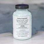The right of a 19oz bottle of Spazazz respiratory Therapy on the side of a hot tub