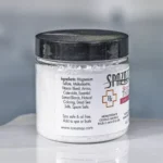 The left of a 4oz bottle of Spazazz skinny Therapy on the side of a hot tub