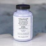 A 19oz bottle of Spazazz Stress Therapy on the side of a hot tub