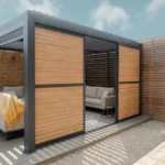 Maze Living Como pergola in dark grey with wood effect adjustable louvres with slats angled closed and one door slid open to give gap in the middle to walk through.